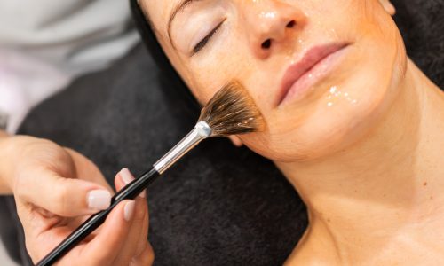cosmetologist-doing-skincare-treatment-on-face-of-2024-01-08-21-56-15-utc (2)